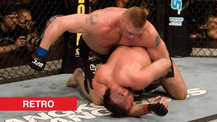 Brock Lesnar punches Heath Herring on the ground during their fight at UFC 87