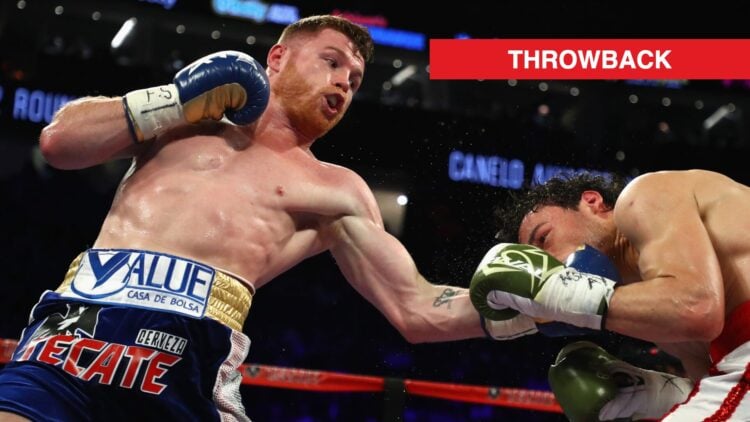 Canelo Alvarez punches Julio Cesar Chavez Jr. during their super middleweight boxing match in 2017