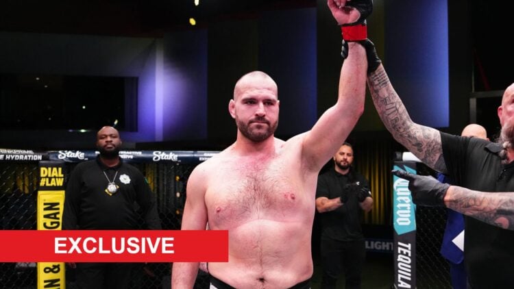 Martin Buday after defeating Uran Satybaldiev with exclusive banner