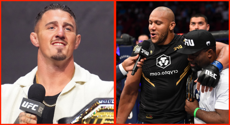 Tom Aspinall answers a question during the UFC 304 press conference, opposite Ciryl Gane and Fernand Lopez in the cage after UFC 265